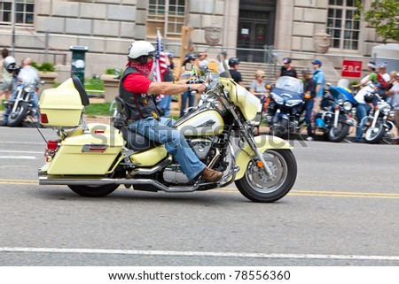 WASHINGTON, DC, USA - MAY 29: Motorcycles travel down Constitution Avenue as part of the annual Rolling Thunder motorcycle ride for American POWs and MIA soldiers. May 29, 2011 in Washington, DC, USA