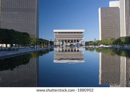 Office Buildings Reflecting in Water