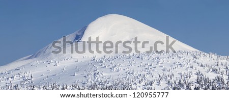 Snow mountain summit. Winter landscape
