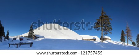 Mountain and tourist camp at the winter time. Natural winter landscape