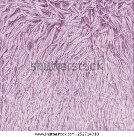 Fur texture. Abstract backgrounds. Pink, purple color carpet