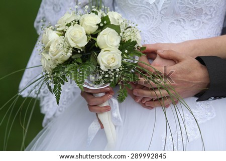 wedding bouquet. Wedding couple holding hands