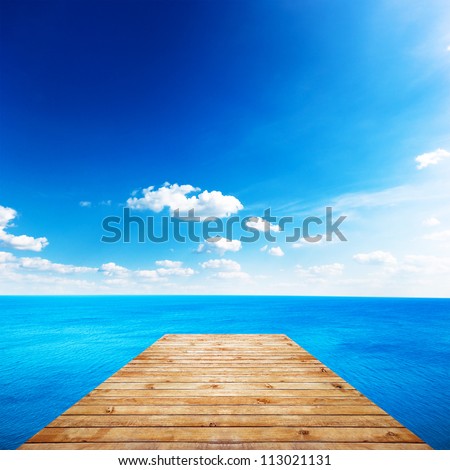 empty wooden pier and beauty seascape background