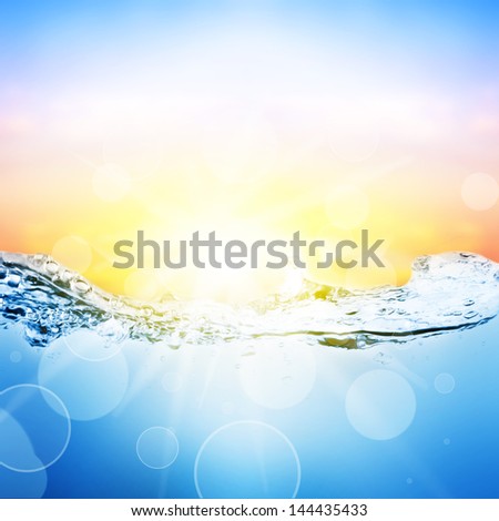 Water and air bubbles over beautifull sunset background