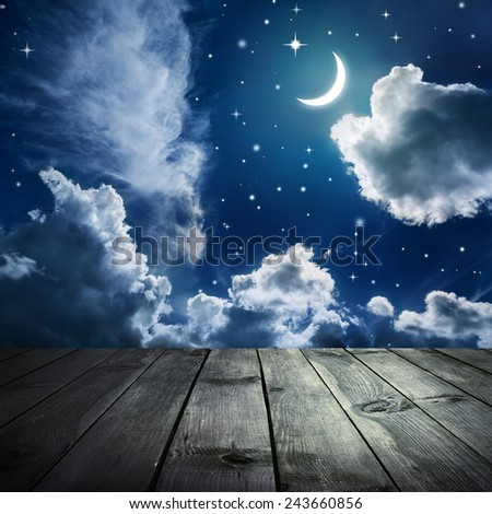 Night sky with stars and moon, wooden planks