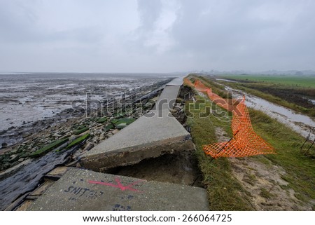 Sea wall smashed by the power of the sea on Mersea Island.