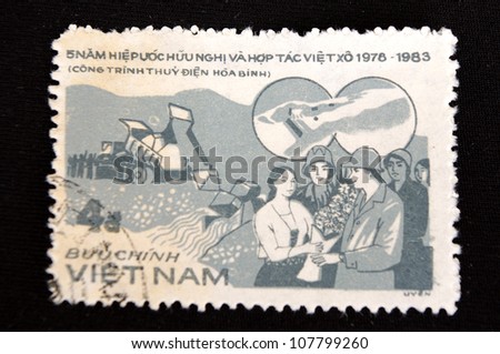 VIETNAM - CIRCA 1968: A stamp printed in Vietnam shows To the workers flowers,circa 1968