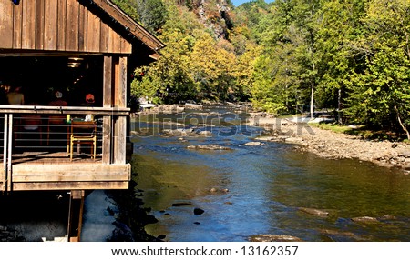 A rustic mountain restaurant overlooking the river in the Smokey Mountains.