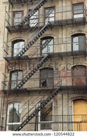 Old building with outdoor staircase (New York City, USA)