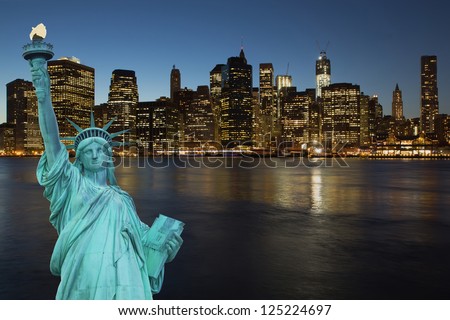 Lower Manhattan in the night. The concept of the Statue of Liberty.  (New York City, USA)