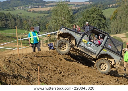 MOHELNICE,  CZECH REPUBLIC - SEPT 28: Small grey off road car is hitting a hill in the BIG SHOCK! CUP of the Czech Republic. On September 28, 2014  in MOHELNICE, Czech Republic.