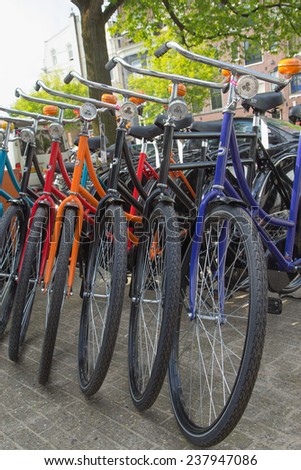 AMSTERDAM, NETHERLANDS- JUN 26: Bicycle rentals are readily available throughout the city. Central, Leidseplein and Dam Square are all major rental hubs. On June 26, 2014  in AMSTERDAM, Netherlands.