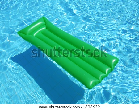 A Green Floating Lilo On A Swimming Pool Stock Photo 1808632 : Shutterstock