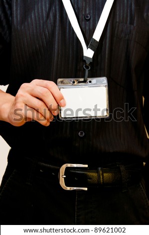 business man with employee badge