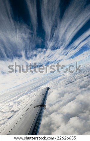 Cool cold front layered clouds in perspective blue sky