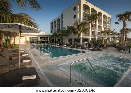 Florida beach vacation hotel with reflecting swimming pool