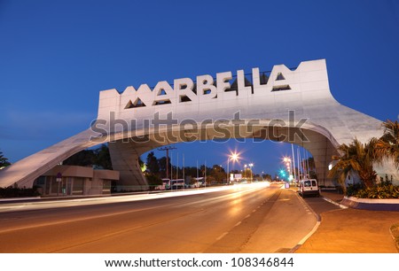 MARBELLA - MAY 21: Marbella Arch at the Costa del Sol illuminated at night on 5th of May 2012 in Marbella, Andalusia Spain. The arch marks the entrance to Marbella and is a icon of the town.