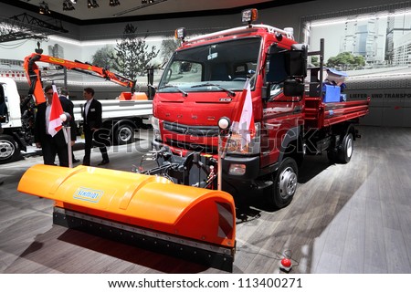 HANNOVER - SEP 20: Mitsubishi Fuso Snow Cleaning  Truck at the International Motor Show for Commercial Vehicles on September 20, 2012 in Hannover Germany