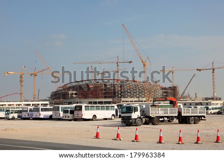 DOHA, QATAR - DEC 16:Construction of a stadium in the desert of Qatar, Middle East.  December 16th 2013 in Doha, Qatar, Middle East