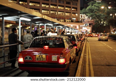 HONG KONG - NOV 27: Toyota Crown Comfort cab at the taxi rank in Tsim Sha Tsui. November 27, 2010 in Hong Kong, China