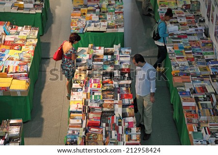 LISBON, PORTUGAL - JUNE 29: People in a bookshop of Gare do Oriente (Orient Station). June 29, 2010 in Lisbon, Portugal