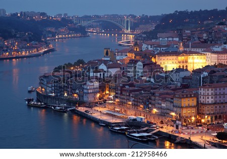 PORTO, PORTUGAL - JULY 1: Douro river and the old town of Porto at dusk. July 1, 2010 in Porto, Portugal