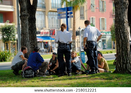 NICE, FRANCE - JULY 2: Police checking young people for drugs. July 2, 2008 in Nice, Provence, France