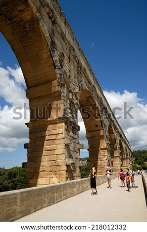 NIMES, FRANCE - JULY 13: Ancient roman aqueduct Pont du Gard in southern France. July 13, 2008 in Provence-Alpes-Cote d\'Azur, France