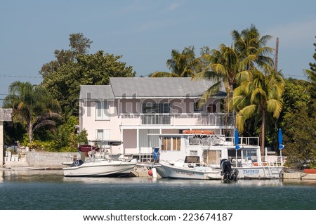 KEY WEST, USA - NOV 19: Waterfront house and boats in Key West. November 19, 2009 in Key West, Florida, USA