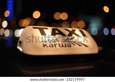 DOHA, QATAR - JAN 9: Doha Taxi Service - Karwa. January 9, 2012 in Doha, Qatar, Middle East