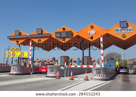 GIRONA, SPAIN - MAY 6: Toll gate on the Mediterranean Highway AP-7 in Spain. May 6, 2015 in Girona, Spain