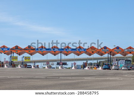 GIRONA, SPAIN - MAY 6: Toll gate on the Mediterranean Highway AP-7 in Spain. May 6, 2015 in Girona, Spain