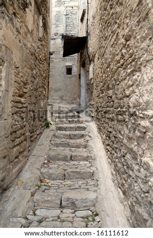Narrow street in medieval town Gordes, southern France