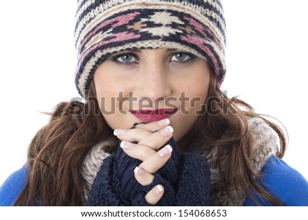 Model Released. Attractive Young Woman Wearing Woolly Hat and Gloves