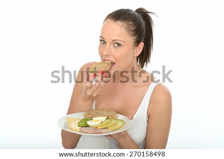 Healthy Young Woman Holding a Plate of a Typical Low Fat Norwegian or Scandinavian Style Breakfast