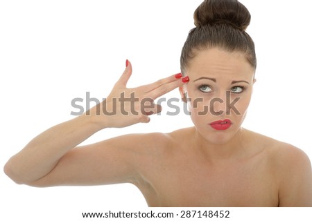 Beautiful Young Caucasian Woman Gesturing As If Holding A Gun To Her Head With Her Hand And Fingers Against White