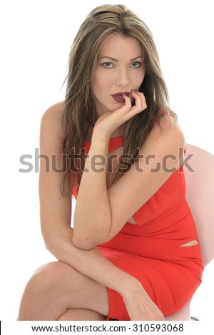 Beautiful Sexy Young Woman Wearing a Revealing Seductive Red Dress