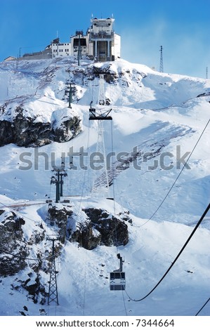 Cervinia mountain resort cable car (Italy); winter season; vertical orientation