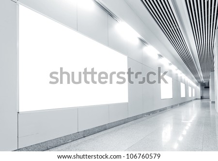 Blank billboard in metro station