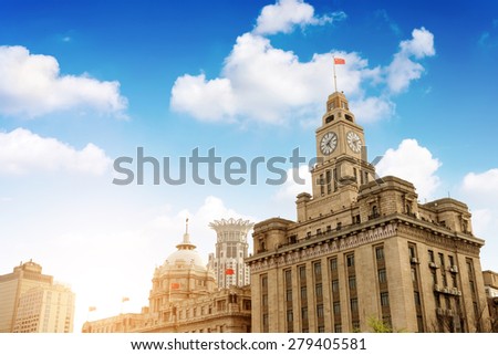 Old Customs Building with Clock and Flag, The Bund, Shanghai, China. The Customs Building was built in 1927.