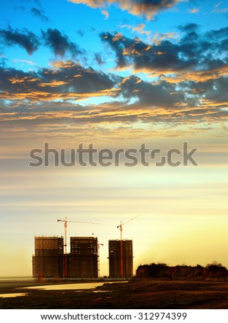 The evening sky and construction sites