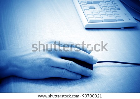 Men are operating the computer, close-up hand.