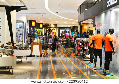 BANGKOK,THAILAND - June 5, 2014 : Sport zone clothing section in a supermarket Siam Paragon in Bangkok. With 300,000 sqm of retail space Siam Paragon is one of the world\'s largest malls.