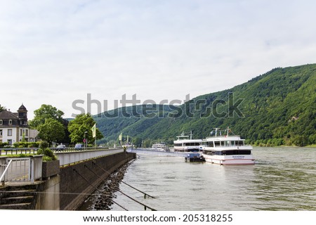MIDDLE RHINE VALLEY, GERMANY - MAY 30, 2014: Cruising the middle-Rhine River is an excellent way to discover the castles and medieval towns of this part of Germany