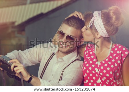 Young couple in love making self-portrait