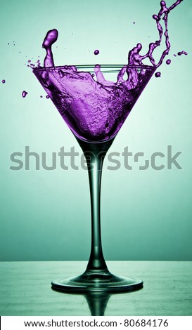 Cocktail in martini glass on the desk