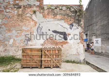 GEORGETOWN, PENANG, MALAYSIA-AUGUST 9, 2015 street art on wall in george town world heritage in Penang, Malaysia, Travel
