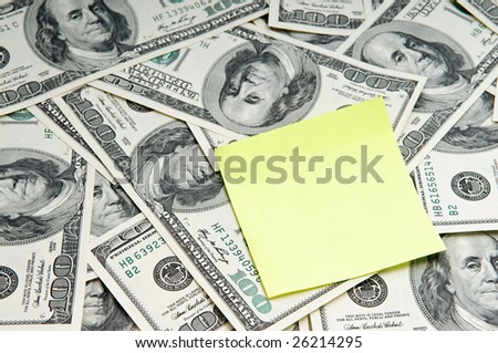 Blank note for your message over american dollar banknotes