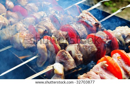 barbecue sticks with meat and vegetables
