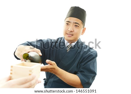 Portrait of an Asian waiter